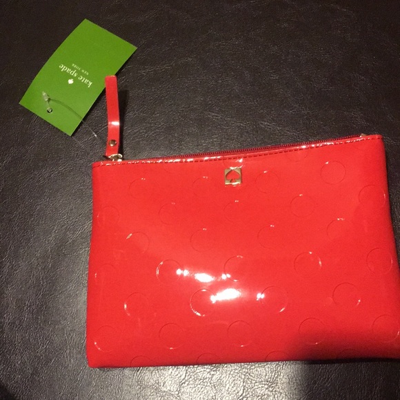kate spade Handbags - New Kate Spade mini pouch in chili red